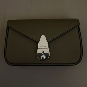 Calvin Klein cross body/ belt bag/ clutch